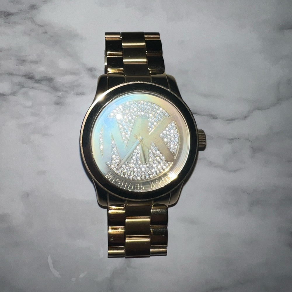Michael Kors Oversized Gold-Tone Logo Watch - Picture 2 of 3